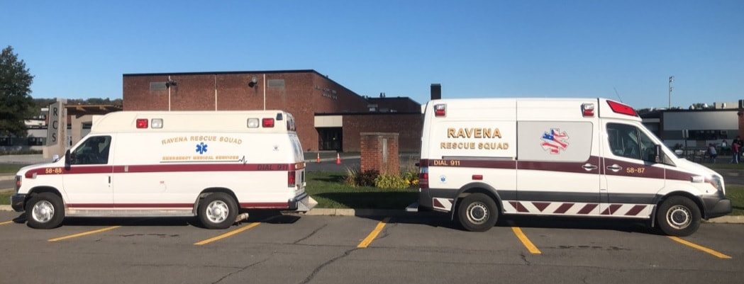 Two Ravena Rescue ambulances at the station
